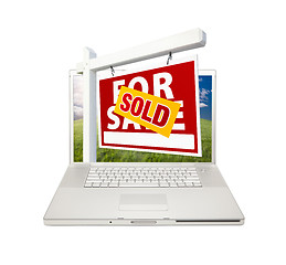 Image showing Sold For Sale Real Estate Sign on Laptop 