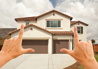 Image showing Female Hands Framing Beautiful House