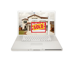Image showing Sold For Sale Real Estate Sign on Laptop 