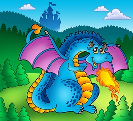 Image showing Big blue fire dragon with old castle