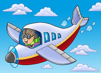 Image showing Cartoon aviator on blue sky