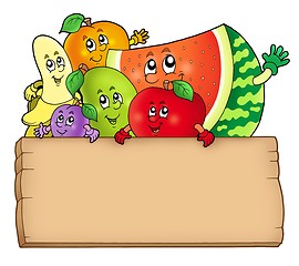Image showing Cartoon fruits holding wooden table