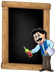 Image showing Blackboard with waiter serving wine