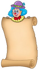 Image showing Cartoon clown holding old scroll