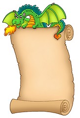 Image showing Giant green dragon holding scroll