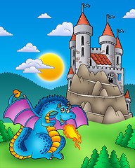 Image showing Blue dragon with castle on hill