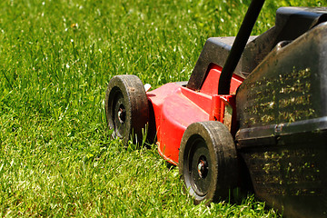 Image showing Lawnmower on grass