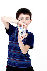 Image showing Young boy with digital camera