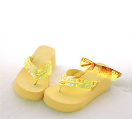 Image showing Sunglasses Sandals and Snow