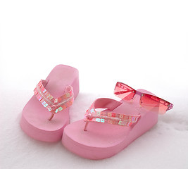 Image showing Sunglasses Sandals and Snow