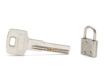 Image showing Big key and a small padlock isolated