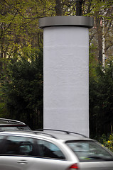 Image showing Advertising pillar with traffic