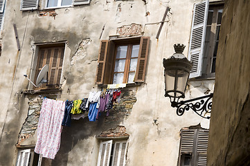 Image showing laundry hanging medieval architecture bastia corsica