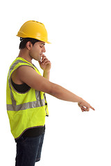 Image showing Construction worker looking pointing down