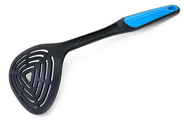 Image showing Plastic blackenning spoon with blue handle