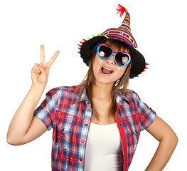 Image showing Beautiful girl in colour hat and sunglasseses