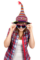 Image showing Beautiful girl smiles in sunglasseses and colour hat