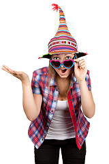 Image showing Beautiful girl smiles in sunglasseses and colour hat