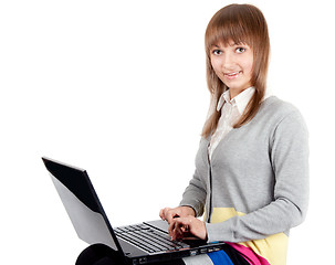 Image showing Young beautiful girl with computer