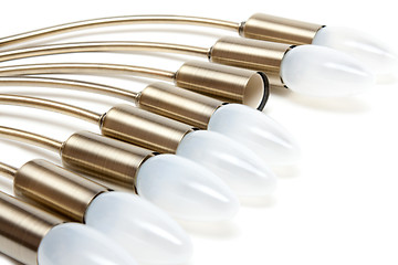 Image showing Electric light bulbs in golden patron