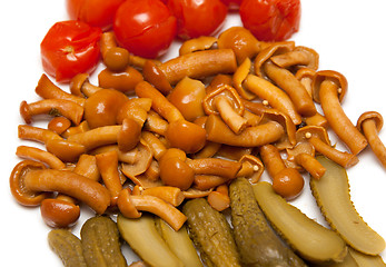 Image showing Pickled mushrooms, tomatoes and cucumber