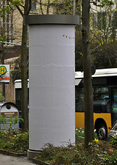 Image showing City scenery - advertising pillar with traffic