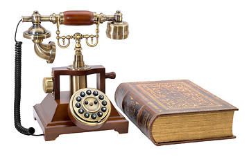 Image showing Ancient phone and  book