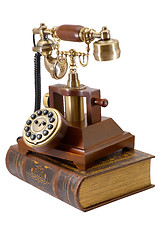 Image showing Ancient phone and book