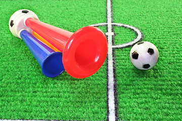 Image showing soccer horn with football