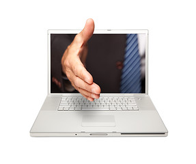 Image showing Man Reaching for a Handshake Through Laptop Screen