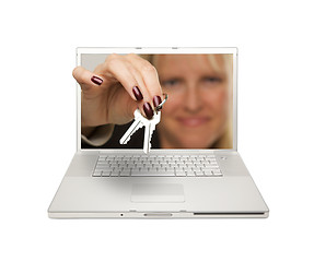 Image showing Woman Handing House Keys Through Laptop Screen