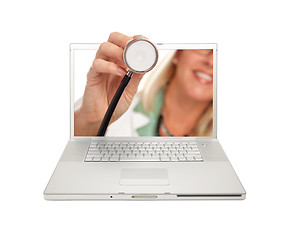 Image showing Female Doctor Holding Stethoscope Through Laptop Screen