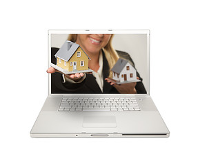 Image showing Woman Handing House Through Laptop Screen