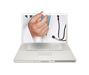 Image showing Doctor Handing Pill Through Laptop Screen