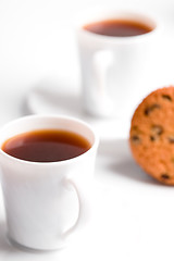 Image showing two cups of coffee and muffin