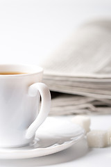 Image showing cup of coffee and newspapers