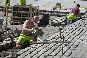 Image showing Working in the heat