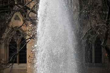 Image showing Fountain in front of old gothic church
