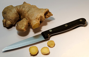 Image showing Fresh ginger with knife