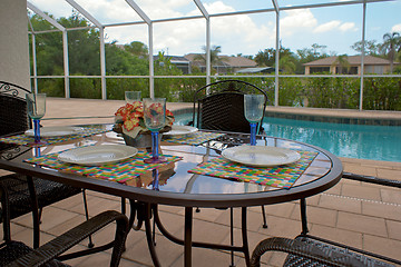 Image showing outdoor table setting for four