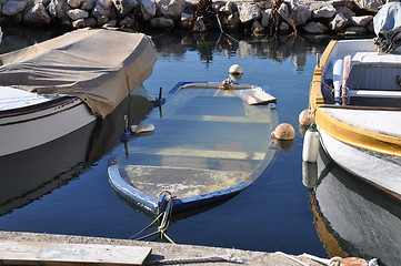 Image showing Sinking fisherboat