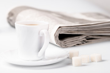 Image showing cup of coffee, sugar and newspapers