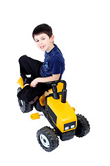 Image showing small boy on the yellow tractor