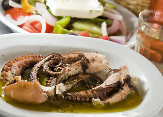 Image showing marinated octopus greek salad house wine Greek Islands Ios