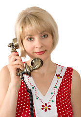 Image showing The beautiful woman with ancient phone