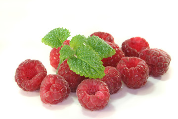 Image showing raspberries with lemon balm