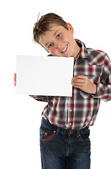 Image showing Boy holding your sign advert or message