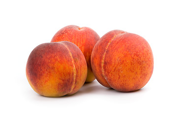 Image showing three peaches