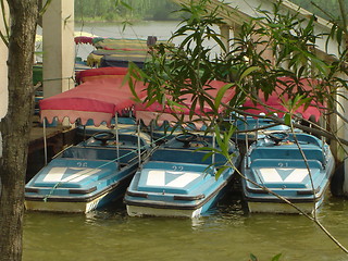 Image showing Blue motor boats