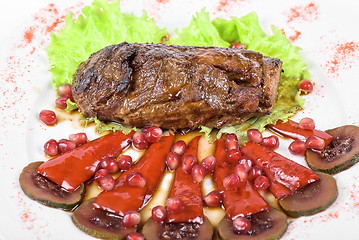 Image showing beef steak with pomegranate